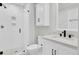 Bright bathroom features a modern vanity, stylish fixtures, and glass enclosed shower at 60 Fairway Dunes Ln, Isle of Palms, SC 29451