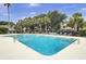 Community pool featuring clear blue water, a spacious deck and plenty of lounge chairs at 60 Fairway Dunes Ln, Isle of Palms, SC 29451