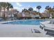 Community pool featuring clear blue water, a spacious deck and plenty of lounge chairs at 60 Fairway Dunes Ln, Isle of Palms, SC 29451
