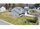 Aerial view of a well-maintained home with a spacious backyard in a residential neighborhood at 629 English Oak Cir, Moncks Corner, SC 29461