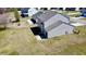 Aerial view of the rear exterior showing a spacious backyard and other houses in the neighborhood at 629 English Oak Cir, Moncks Corner, SC 29461