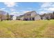 Expansive backyard with well-maintained lawn and residential views at 629 English Oak Cir, Moncks Corner, SC 29461