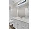 Bright bathroom with tub/shower, vanity with sink, and modern lighting at 629 English Oak Cir, Moncks Corner, SC 29461