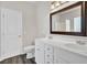 Bathroom with double sinks, large mirror, white cabinets, and plenty of storage at 629 English Oak Cir, Moncks Corner, SC 29461