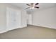 Bedroom with carpet, neutral paint, double-door closet, and ceiling fan at 629 English Oak Cir, Moncks Corner, SC 29461