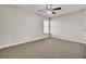 Bedroom with neutral paint, carpet, ceiling fan, and large window at 629 English Oak Cir, Moncks Corner, SC 29461