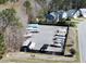 Community boat and RV storage area within a fenced, gravel lot, near residential homes at 629 English Oak Cir, Moncks Corner, SC 29461