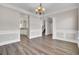 Dining area featuring wood floors, chandelier lighting and decorative trim at 629 English Oak Cir, Moncks Corner, SC 29461