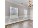Dining room featuring wood floors, windows, and elegant chandelier lighting at 629 English Oak Cir, Moncks Corner, SC 29461