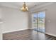 Dining area featuring wood floors, chandelier lighting and sliding glass doors at 629 English Oak Cir, Moncks Corner, SC 29461
