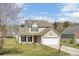 Well maintained two-story home with a two car garage, a manicured lawn, and a welcoming entrance at 629 English Oak Cir, Moncks Corner, SC 29461