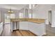 Bright kitchen with stainless appliances, an island sink, and granite countertops at 629 English Oak Cir, Moncks Corner, SC 29461
