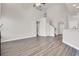 Open concept living room with soaring ceilings and wood floors throughout at 629 English Oak Cir, Moncks Corner, SC 29461
