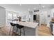 Modern kitchen island with seating and ample counter space, perfect for entertaining guests at 68 Red Bluff St, Summerville, SC 29483