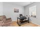 Well-lit home office with comfortable seating and a functional workspace at 68 Red Bluff St, Summerville, SC 29483