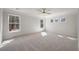 Bright and airy bedroom with plush carpeting and ample natural light from multiple windows at 8703 Forte Dr, North Charleston, SC 29406