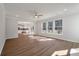 Spacious living room with wood-look floors, plenty of natural light, and an open layout at 8703 Forte Dr, North Charleston, SC 29406
