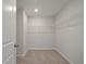 Walk-in closet featuring ample wire shelving for organized storage at 8703 Forte Dr, North Charleston, SC 29406