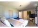 Bedroom with soft lighting, carpet flooring, and soothing, neutral wall colors at 105 Wade Ct, Summerville, SC 29486