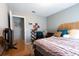 Cozy bedroom featuring a bed, colorful linens and throw pillows, and carpet flooring at 105 Wade Ct, Summerville, SC 29486