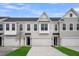 New construction featuring an attached garage and a covered front porch entrance at 108 Brown Swiss Cir, Summerville, SC 29483