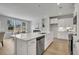 Modern kitchen with white cabinets, stainless steel appliances, and an island with a sink at 108 Brown Swiss Cir, Summerville, SC 29483