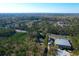 Aerial view of a home nestled in mature trees near a residential area at 10812 Dorchester Rd, Summerville, SC 29485