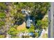 Aerial view of the home with surrounding trees and a road nearby at 10812 Dorchester Rd, Summerville, SC 29485