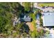 Aerial view showcasing the home's nestled among trees with ample parking at 10812 Dorchester Rd, Summerville, SC 29485
