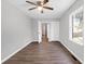 Bedroom featuring wood-look floors, natural light and a ceiling fan at 10812 Dorchester Rd, Summerville, SC 29485
