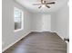 Bedroom featuring wood-look floors, natural light and a ceiling fan at 10812 Dorchester Rd, Summerville, SC 29485