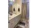 Well-lit bathroom with double vanity, shower, and neutral-toned decor at 112 Amanda Cir, Goose Creek, SC 29445