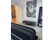 Stylish bedroom decor featuring a bench, unique artwork, a full-length mirror, and black and white bedding at 112 Amanda Cir, Goose Creek, SC 29445