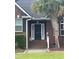Close up of the front door and entryway with a stone statue at 112 Amanda Cir, Goose Creek, SC 29445