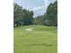 Beautiful golf course fairway with lush green grass and a winding cart path at 112 Amanda Cir, Goose Creek, SC 29445