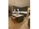 Bright kitchen featuring a spacious island with bar seating and a view of stainless steel appliances at 112 Amanda Cir, Goose Creek, SC 29445