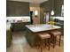 Bright, open kitchen featuring a central island, stainless appliances, and overhead lighting, making it an ideal space at 112 Amanda Cir, Goose Creek, SC 29445