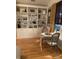 Sitting area with built-in shelving and hardwood floors at 112 Amanda Cir, Goose Creek, SC 29445