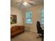 A cozy office nook featuring a futon and windows providing natural light at 112 Amanda Cir, Goose Creek, SC 29445