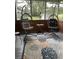 Relaxing patio area with comfortable egg chair swings and a rug at 112 Amanda Cir, Goose Creek, SC 29445