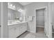 Bathroom featuring double vanity, tile floors, and walk-in closet at 114 Brown Swiss Cir, Summerville, SC 29483