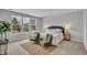Bedroom with natural light, soft carpet, and comfortable seating at 114 Brown Swiss Cir, Summerville, SC 29483
