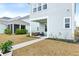 Charming backyard with a covered porch and well-maintained landscaping at 115 Winding Branch Dr, Summerville, SC 29486