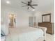 Bedroom with ensuite bathroom featuring a stand-up shower, ceiling fan and dresser at 115 Winding Branch Dr, Summerville, SC 29486