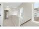 Upstairs hallway with natural light, carpet flooring and views to the neighborhood at 115 Winding Branch Dr, Summerville, SC 29486