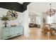 Bright and airy living space featuring modern decor, hardwood floors, and seamless flow into the dining area at 115 Winding Branch Dr, Summerville, SC 29486