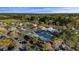 Aerial view of the community with tennis courts, pools, clubhouse, and lush landscaping at 1251 Weather Helm Dr, Mount Pleasant, SC 29466