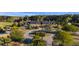 Aerial view of the clubhouse with circular drive, manicured landscaping, and mature trees at 1251 Weather Helm Dr, Mount Pleasant, SC 29466