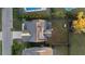 Aerial view of a well-maintained home with solar panels, a pool, and a spacious backyard at 1251 Weather Helm Dr, Mount Pleasant, SC 29466