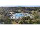 Aerial view of the resort style pool, sun loungers, umbrellas, and manicured grounds at 1251 Weather Helm Dr, Mount Pleasant, SC 29466
